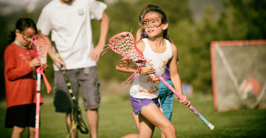 Girl playing lacrosse
