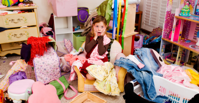 Girl in a messy bedroom