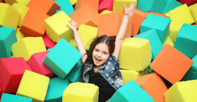 Child playing in the soft play