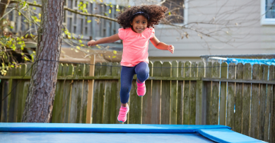 Gilr on a trampoline