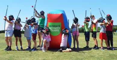 staff member with children on camp