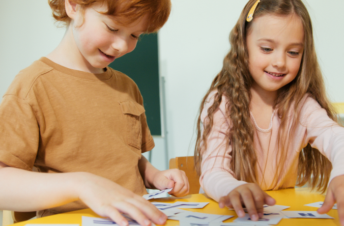 children playing a card game