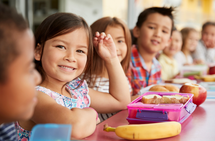 Children eating a packed lunch