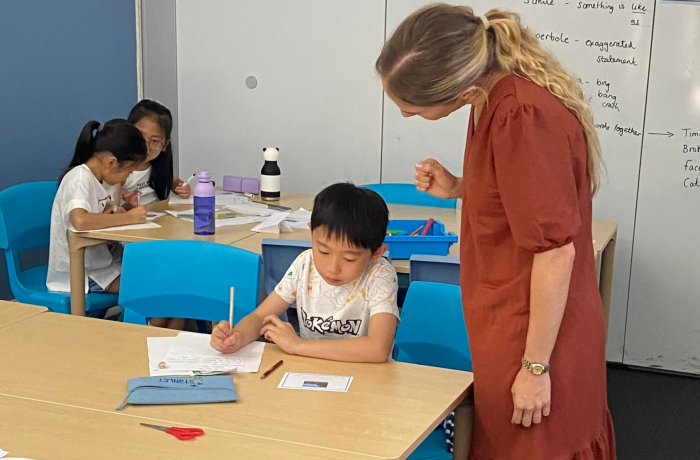 Tutor and student studying for the 11+ exam