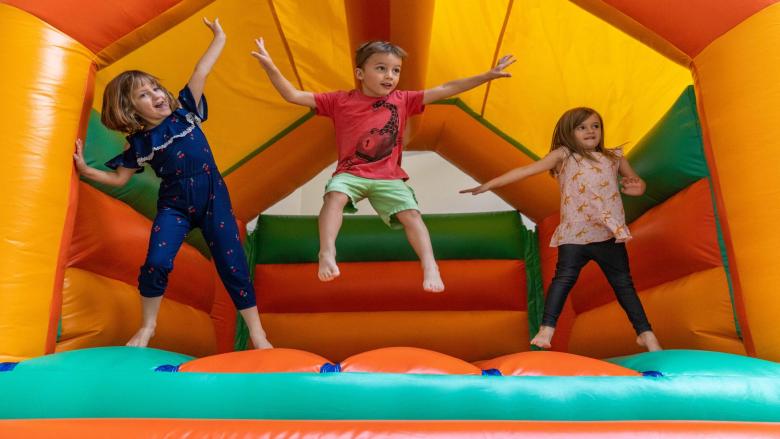 Children on bouncey castle