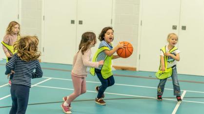 Kids running in sports hall