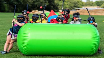 Children playing combat archery