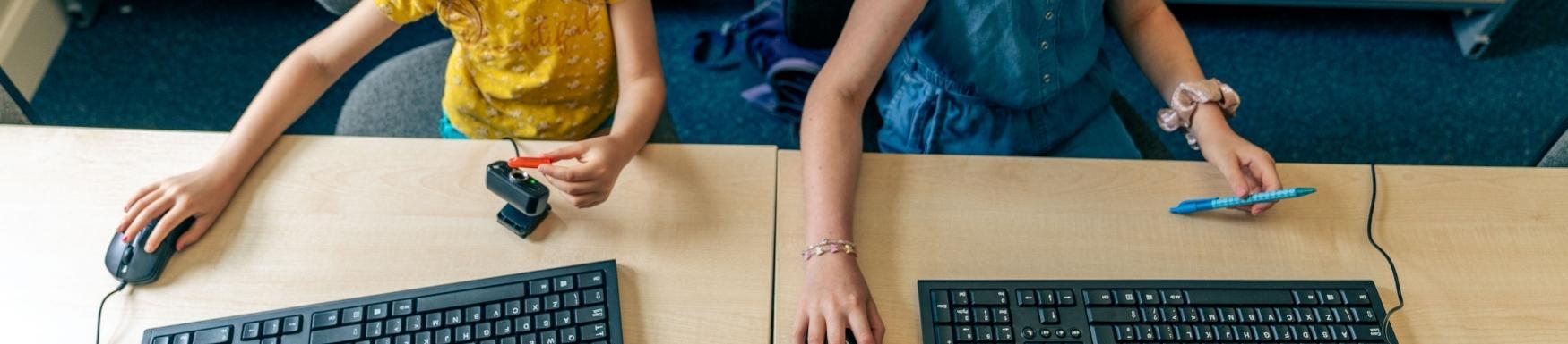 children on keyboards