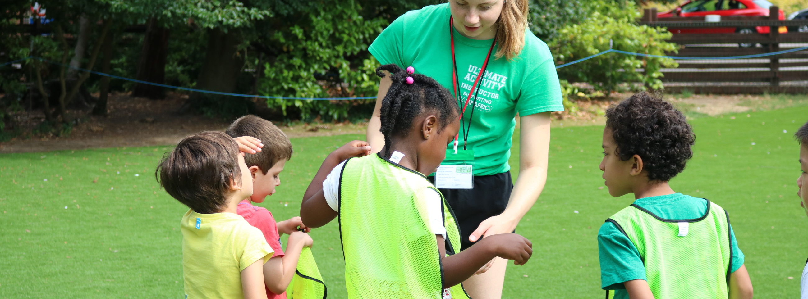 staff member helping kids