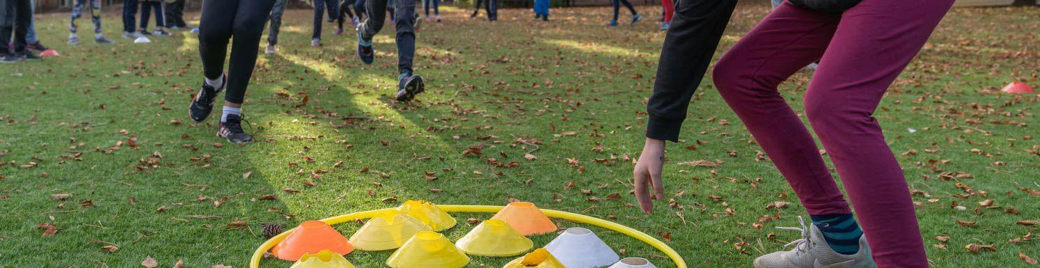 School holiday camp activities for all ages from 7-14 year olds at Surbiton Hinchley Wood Sports Ground, Esher