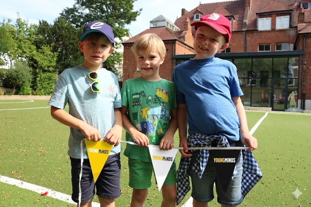 Boys holding bunting